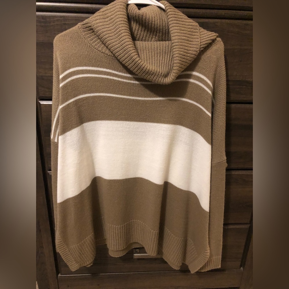 Boutique turtle neck sweater. Tag is One Size but fits like medium/large.